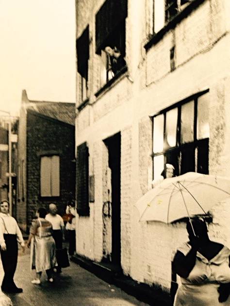 Black & white photograph of site specific performance 9 Windows 1997